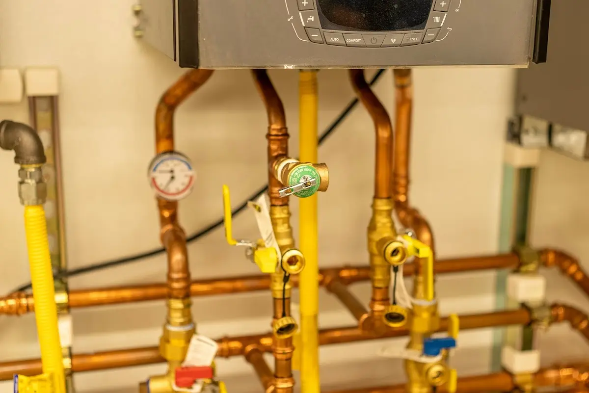 Licensed technician providing Water Heater Installation for a homeowner in Coshocton